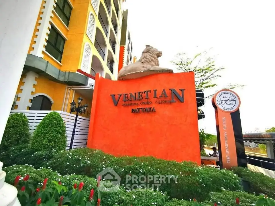 Stunning Venetian-themed condominium entrance with lush greenery in Pattaya.