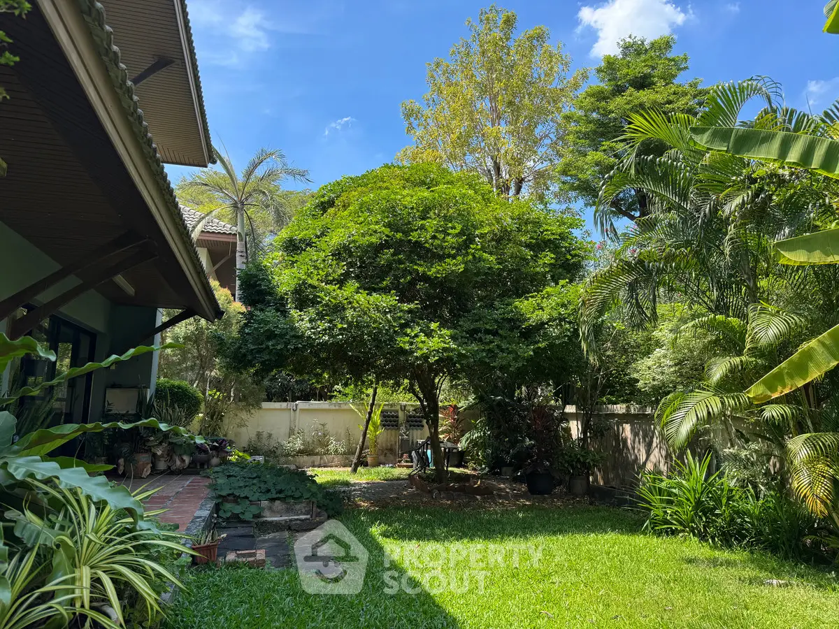 Lush garden oasis with vibrant greenery and serene atmosphere