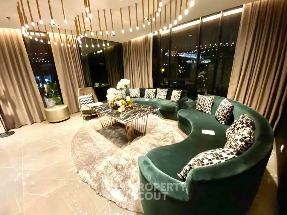 Luxurious living room with elegant curved sofa and modern lighting