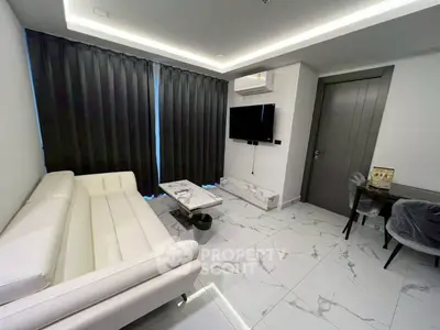 Modern living room with sleek white sofa and marble flooring