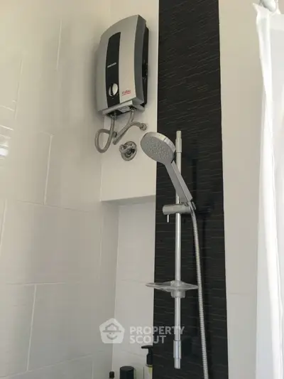 Modern bathroom shower with sleek water heater and stylish tiles