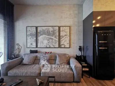 Stylish living room with modern decor and sleek SMEG fridge