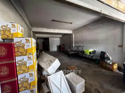 Spacious storage area with ample room for inventory and supplies, ideal for business operations.
