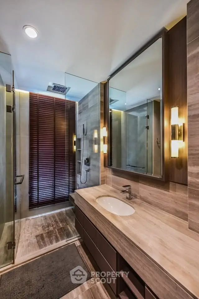Luxurious modern bathroom with sleek design and elegant lighting