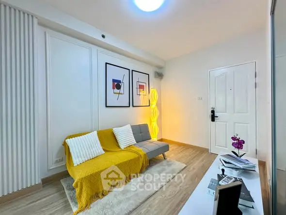 Modern living room with stylish decor and cozy seating area