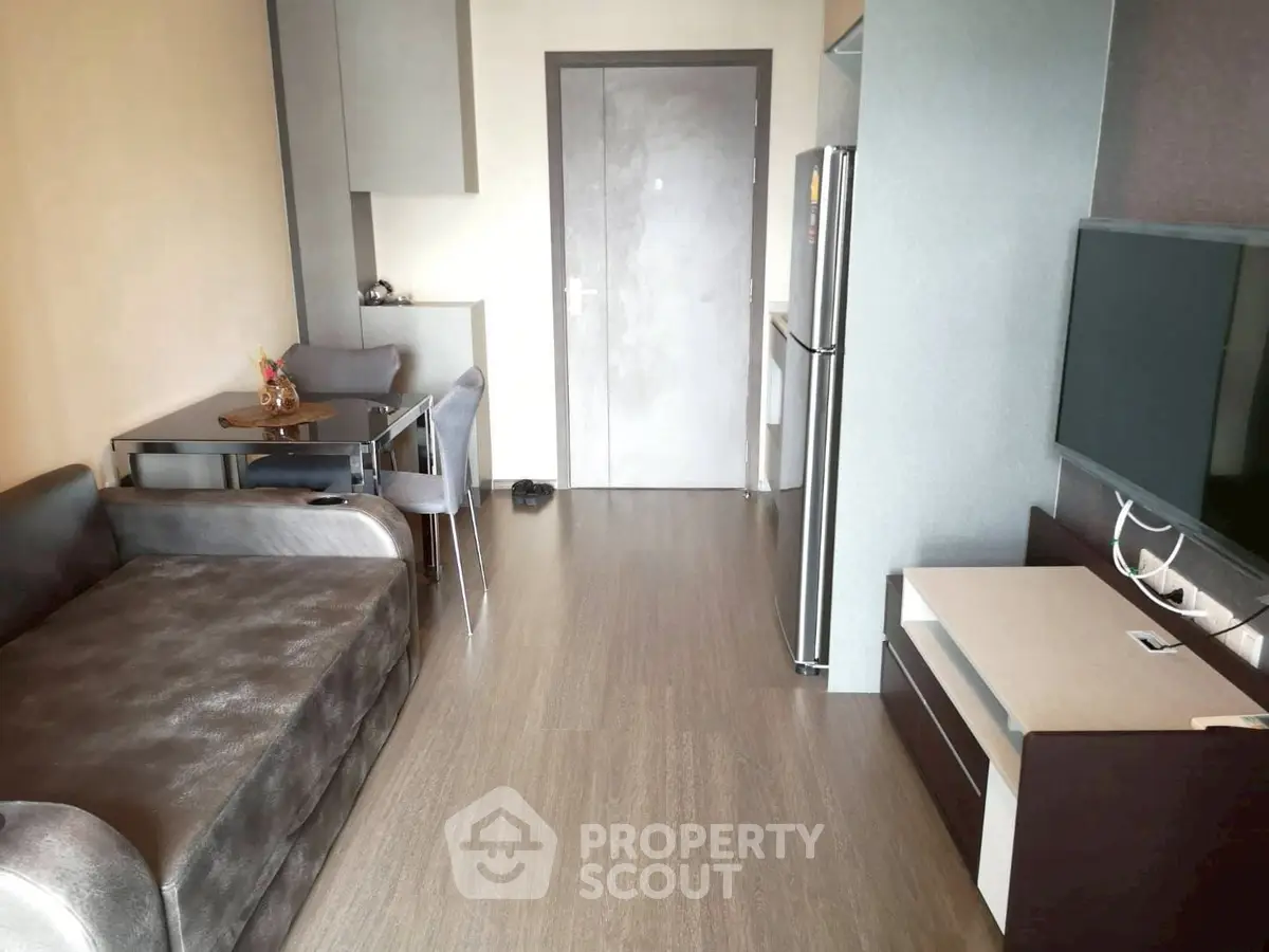 Modern living room with sleek furniture and open layout