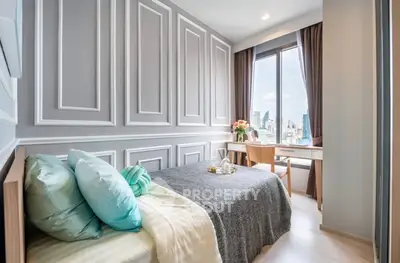 Chic modern bedroom with city view, elegant paneling, and cozy decor in urban apartment.