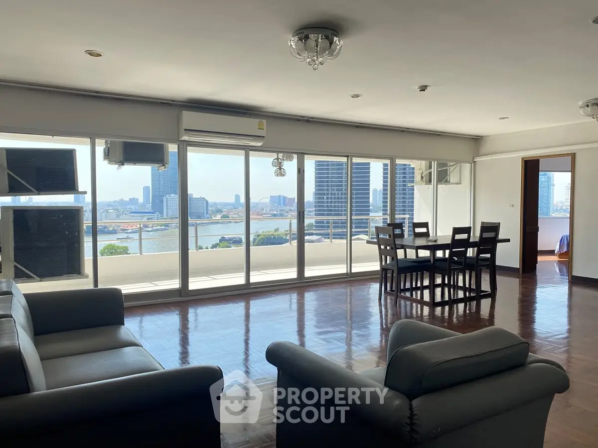 Spacious living room with stunning city view and elegant furniture