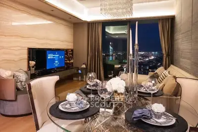 Luxurious living room with elegant dining setup and stunning city view at night.