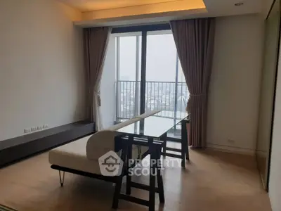 Modern living room with floor-to-ceiling windows and city view
