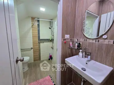 Modern bathroom with sleek fixtures and stylish tile design