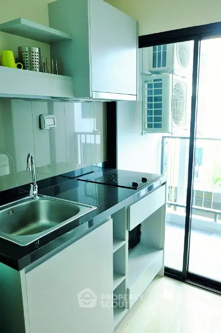 Modern kitchen with sleek cabinetry and stainless steel appliances