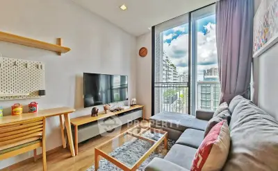 Modern living room with cozy sofa and large window view