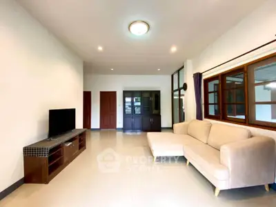 Spacious living room with modern furniture and natural light