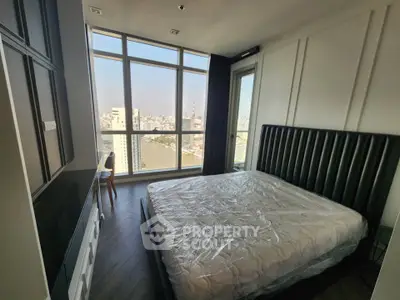 Luxurious bedroom with stunning city view and modern furnishings