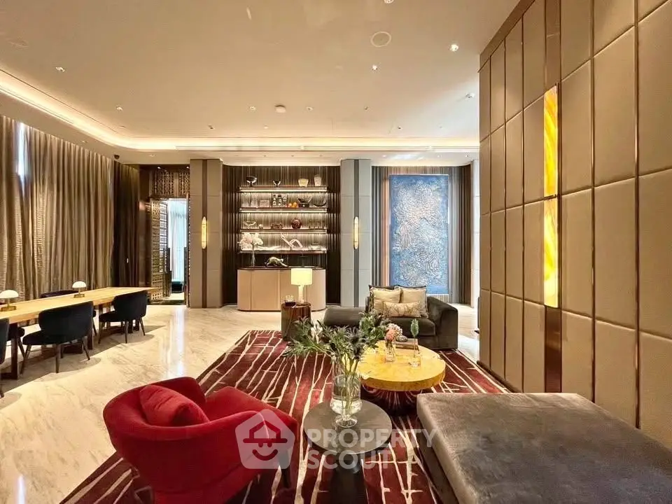 Luxurious living room with elegant decor, plush seating, and ambient lighting for a sophisticated ambiance.