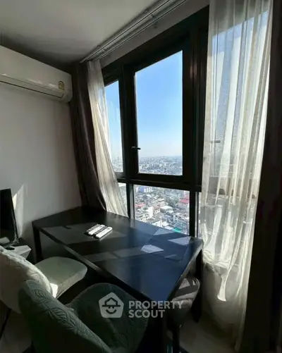 Cozy study nook with stunning city view and natural light