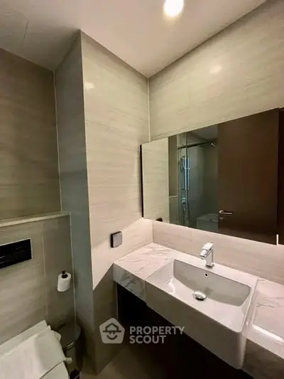 Modern bathroom with sleek fixtures and elegant tile design