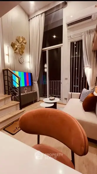 Luxurious modern living room with high ceilings and stylish decor