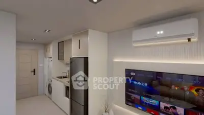 Modern kitchen with sleek appliances and wall-mounted TV in a compact apartment.