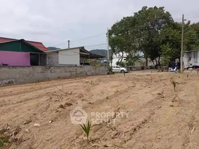 Vacant land plot with potential for development in a serene neighborhood.