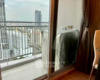 Stunning city view from modern apartment balcony with washing machine