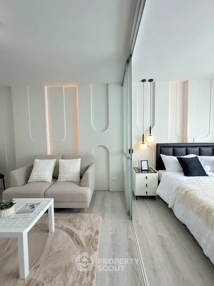 Modern studio apartment with stylish decor and cozy living area