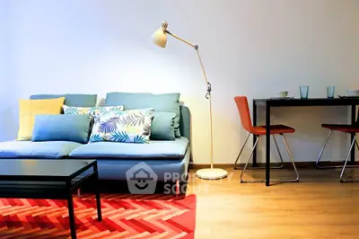 Modern living room with stylish furniture and vibrant decor