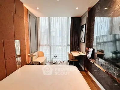 Luxurious modern bedroom with city view, elegant decor, and sleek furnishings.