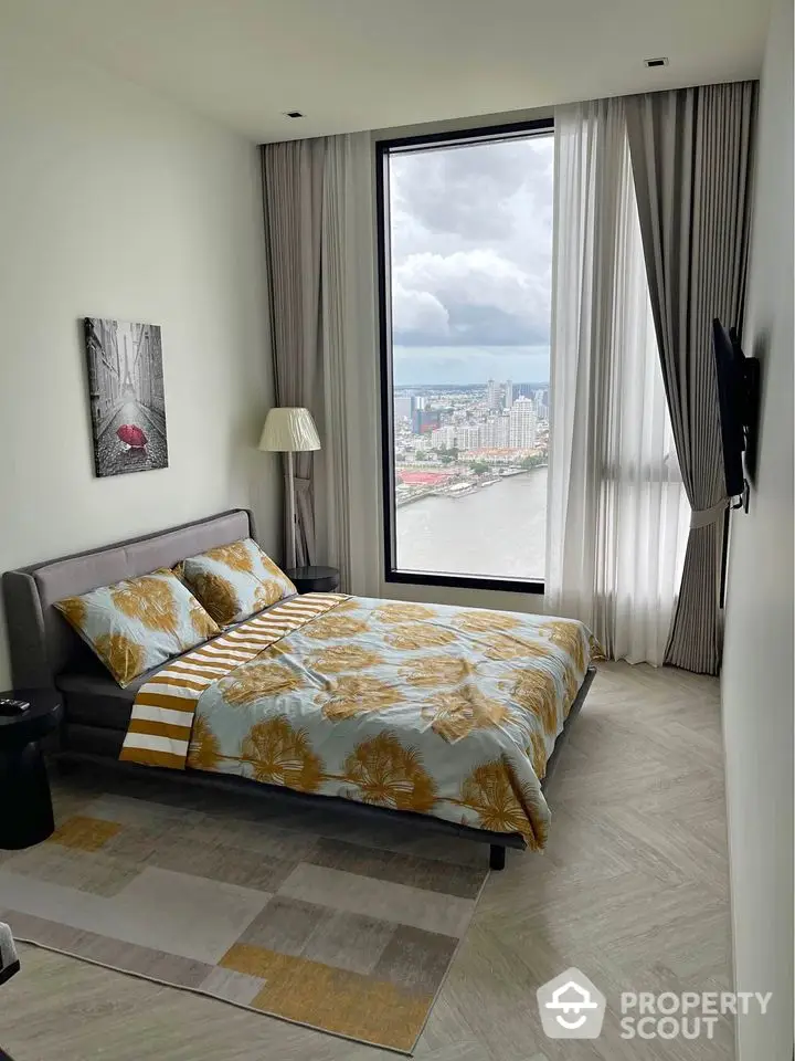 Luxurious bedroom with stunning city view and modern decor