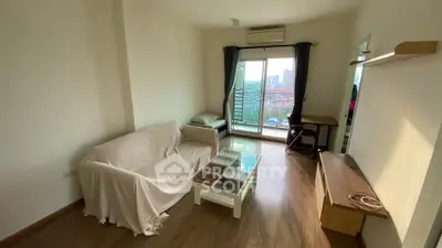 Cozy living room with balcony view in modern apartment