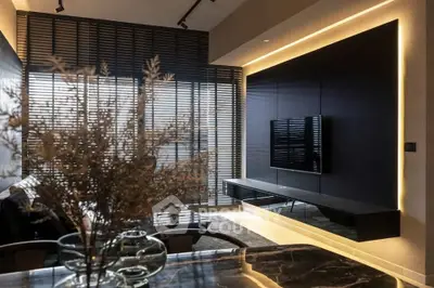Modern living room with sleek design, ambient lighting, and stylish decor for a luxurious lifestyle.