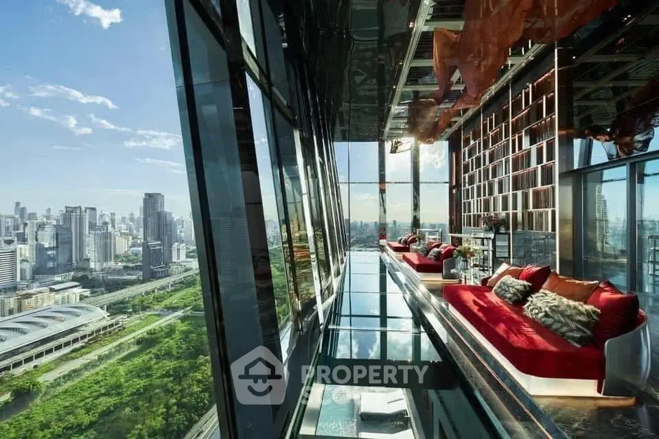 Luxurious high-rise living room with stunning cityscape view and modern design.