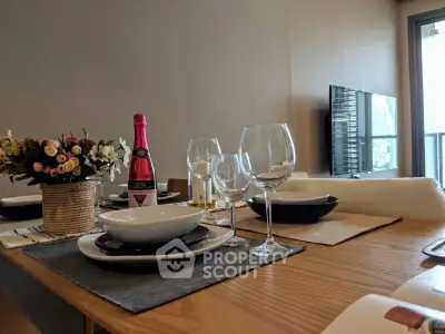 Elegant dining setup in modern living room with balcony view