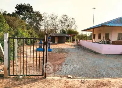 Charming rural property with spacious yard and cozy porch, perfect for serene living.