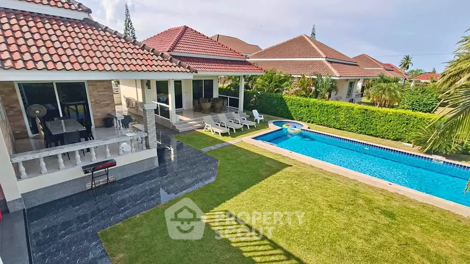 Luxurious villa with private pool and lush garden, perfect for relaxation and entertaining.