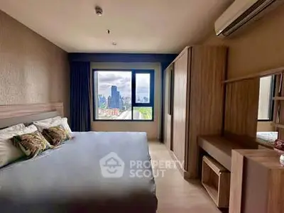 Spacious bedroom with city view in modern apartment