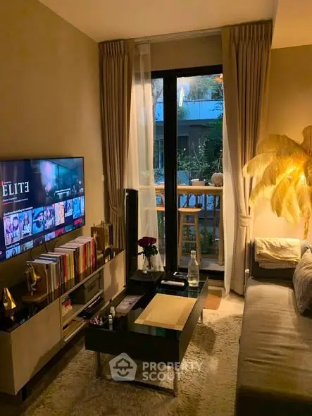 Cozy living room with modern decor and balcony view