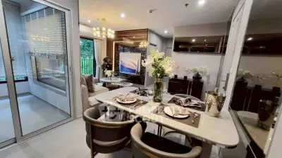 Luxurious modern living room with elegant dining area and stylish decor