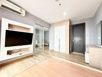 Modern living room with sleek design and wooden flooring