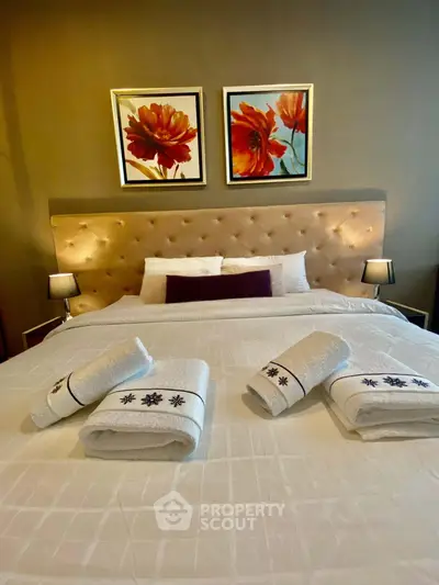 Luxurious bedroom with elegant decor and plush bedding, perfect for relaxation and comfort.