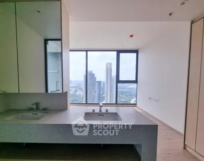 Spacious modern apartment with dual sinks and stunning city view