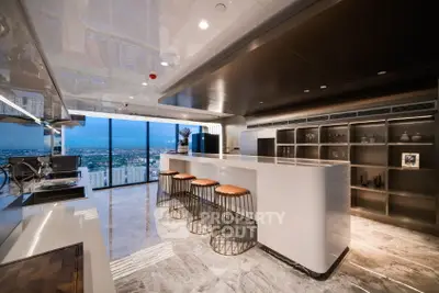 Luxurious modern kitchen with panoramic city view and sleek design