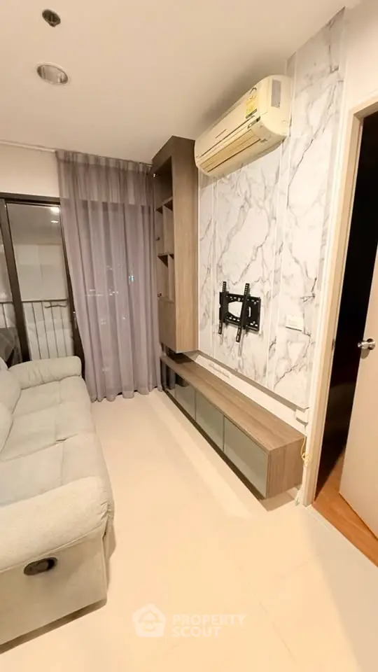 Modern living room with marble accent wall and air conditioning