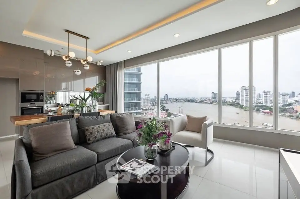 Luxurious living room with panoramic city and river views, modern decor, and elegant lighting.