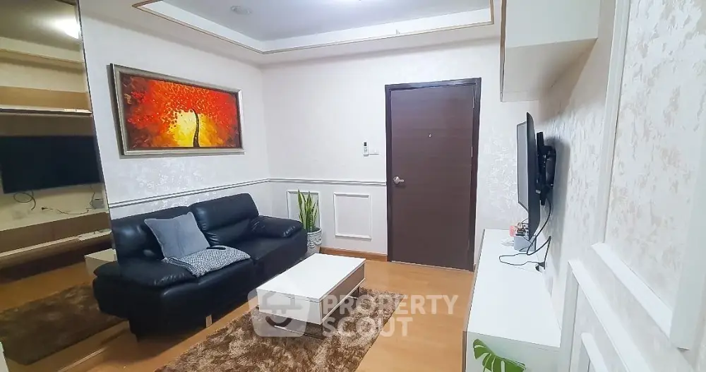 Cozy living room with modern decor and stylish furniture, perfect for relaxation and entertainment.