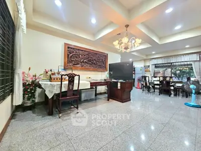 Spacious living room with elegant decor and ample natural light