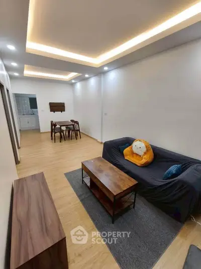 Modern living room with stylish furniture and ambient lighting