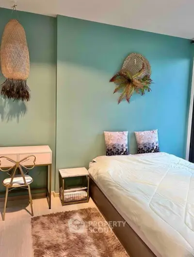 Chic bedroom with stylish decor and cozy ambiance, featuring modern furniture and elegant wall art.