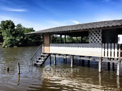 Charming waterfront property with rustic design and serene river views.